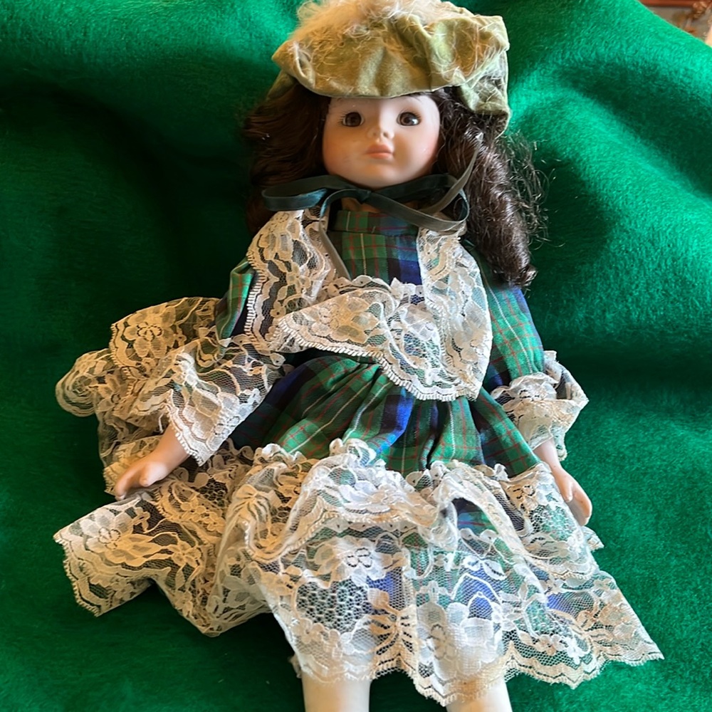 Vintage doll porcelain face and arms .Approximately 13 inches tall